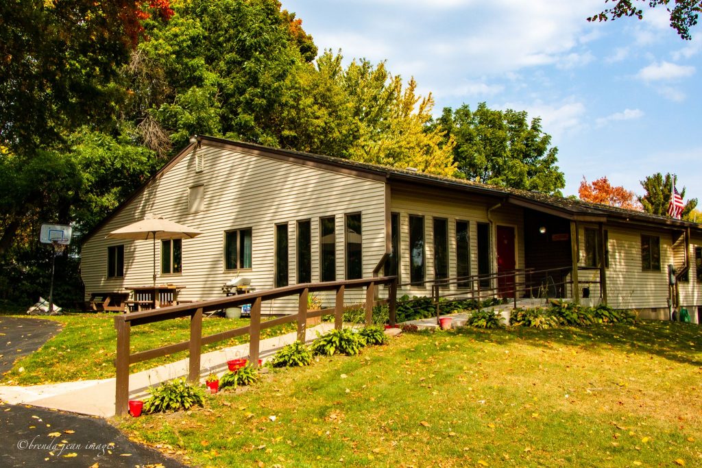 Chisago House Back entrance with sidewalk
